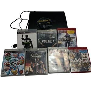 PS3 FAT GAMING SYSTEM BUNDLE. 8 GAMES AND PS3